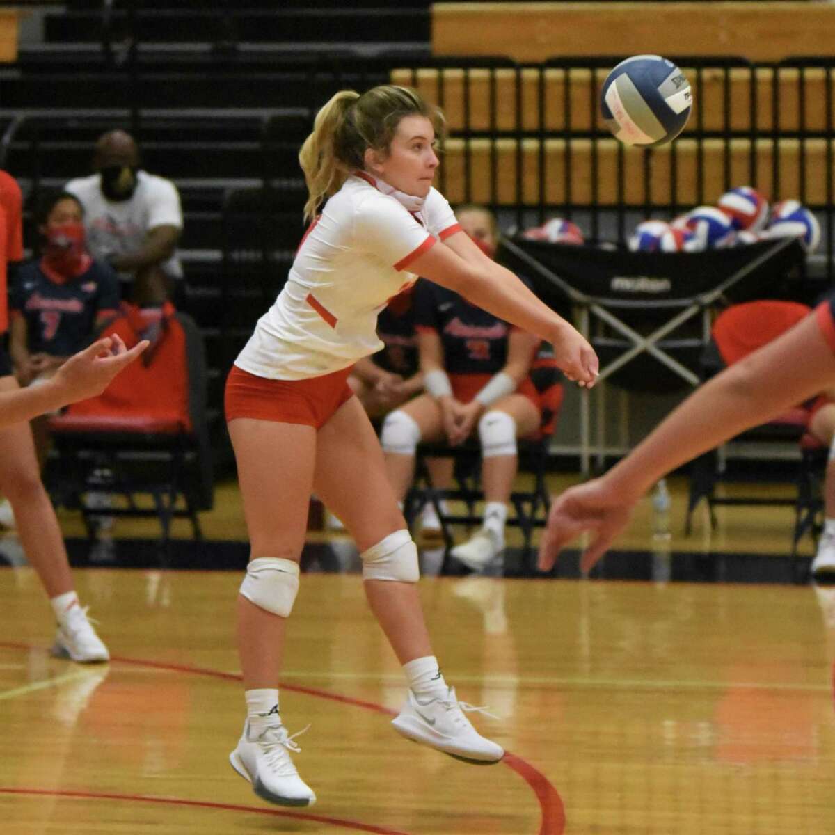 Atascocita junior libero Kayden Tanner prepares for a dig during the Lady Eagles' season opener against Jersey Village.