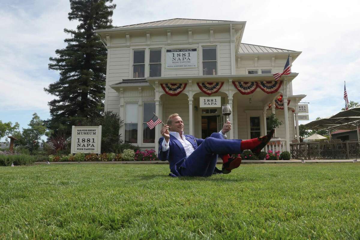 Vintner and entrepreneur Jean-Charles Boisset poses on the lawn outside of 1881 Napa, a “wine museum” he opened in Oakville.
