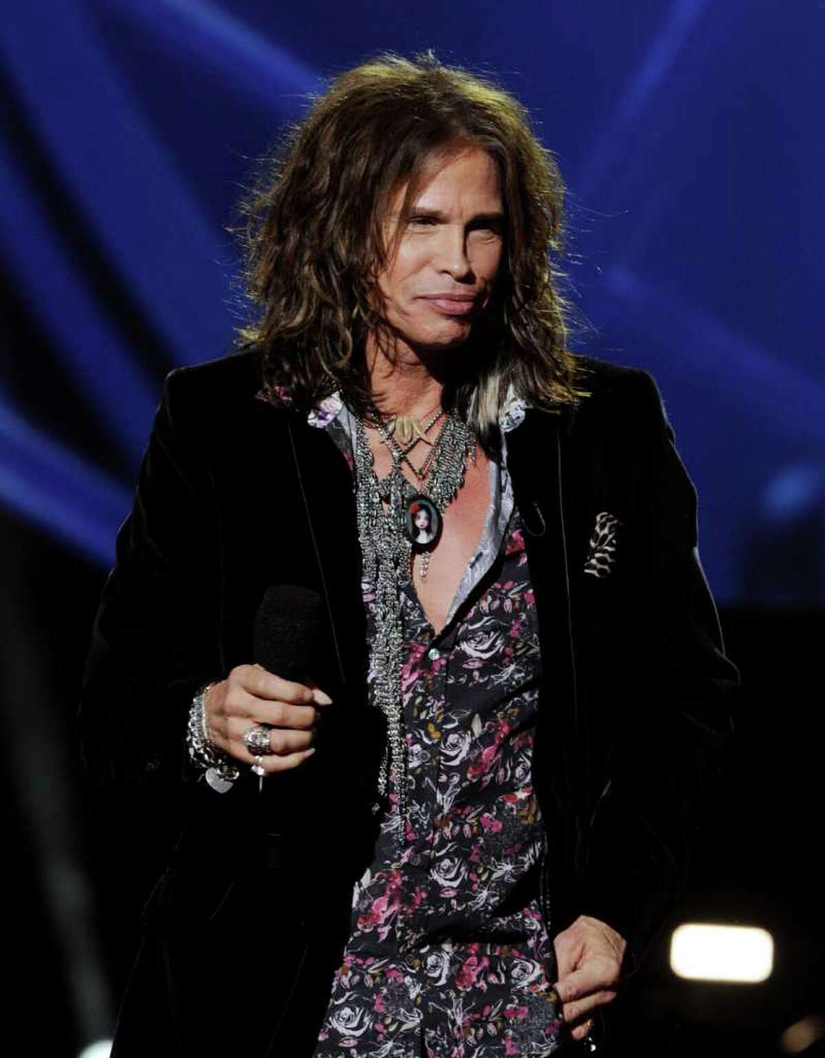 INGLEWOOD, CA - SEPTEMBER 22: Singer Steven Tyler appears onstage at a press conference to officially announce the season 10 "American Idol" judges panel at The Forum on September 22, 2010 in Inglewood, California. (Photo by Kevin Winter/Getty Images) *** Local Caption *** Steven Tyler