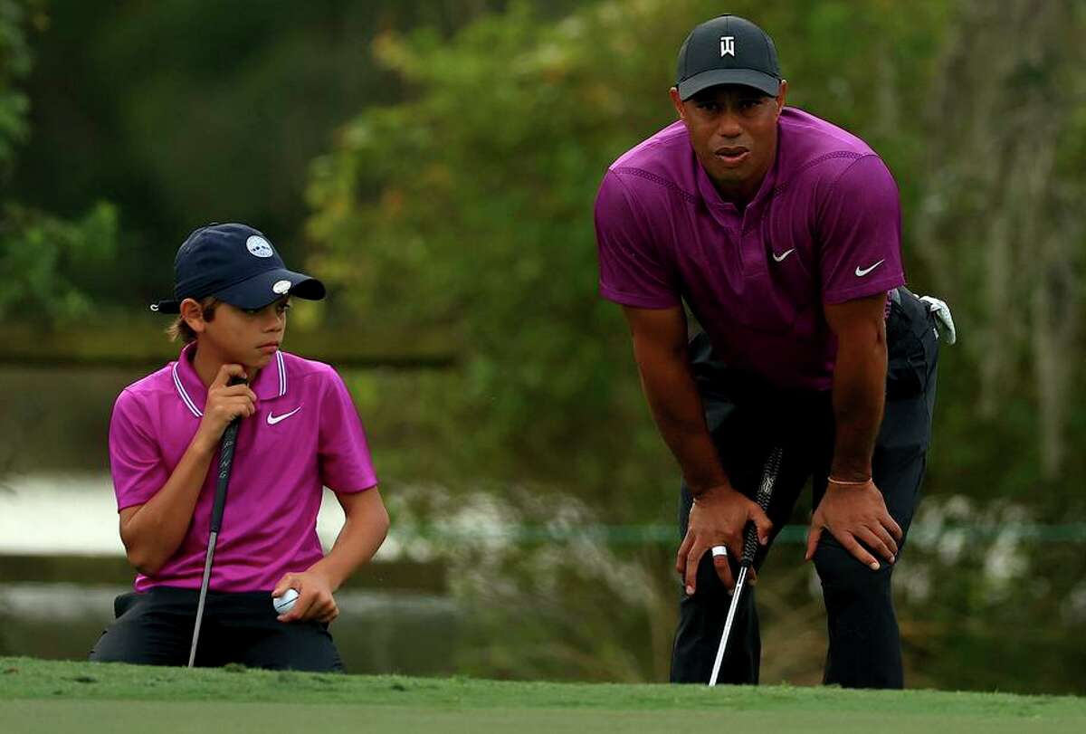 Tiger Woods (right) intends to reteam with his son Charlie at the PNC Championship in Orlando next week.