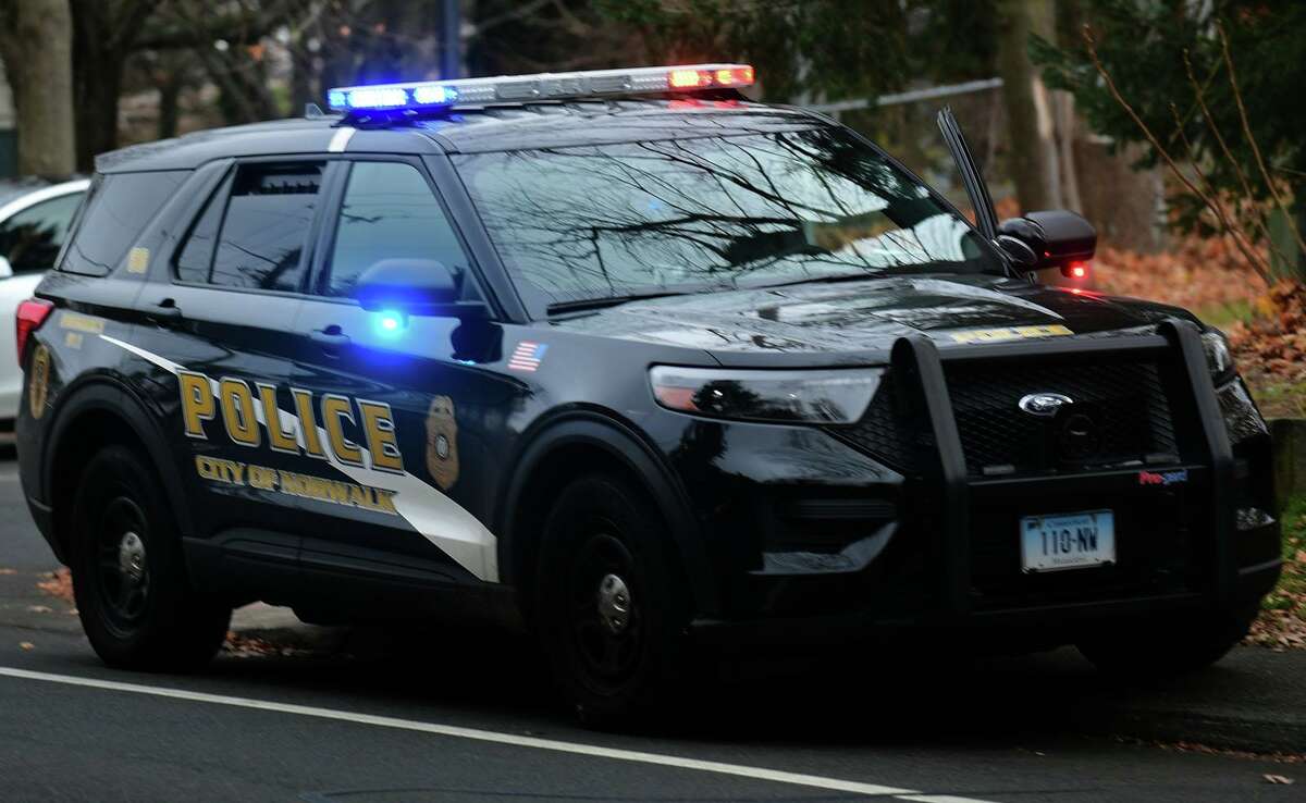 Norwalk police respond to Norwalk High School following another report of a threat Wednesday.