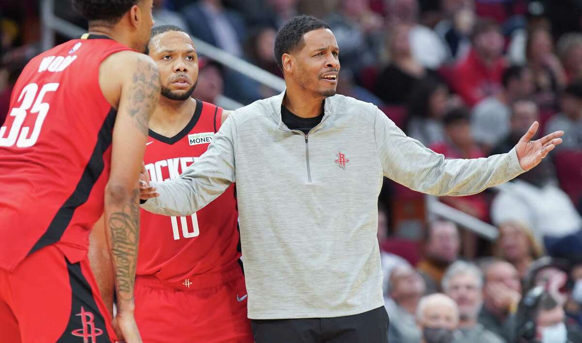 Houston Rockets head coach Stephen Silas reacts to the referee ejecting guard Eric Gordon (10) at the Toyota Center in Houston on Wednesday, Dec. 8, 2021. Rockets beat the Nets 114-104 to continue their winning streak to seven.