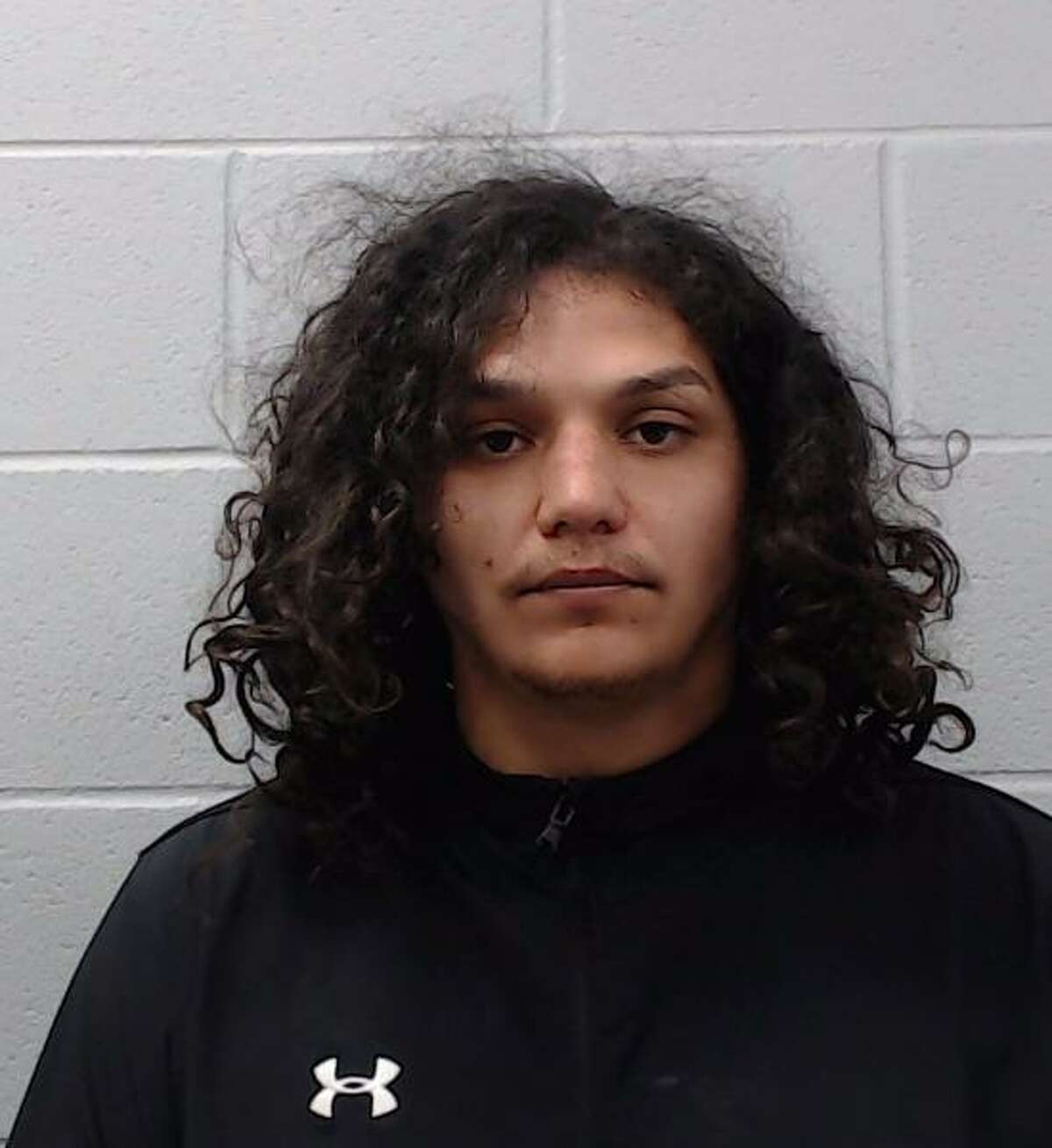 Michael Torres, 25, was charged with murder in connection with the death of Lavonte Craig Benford.