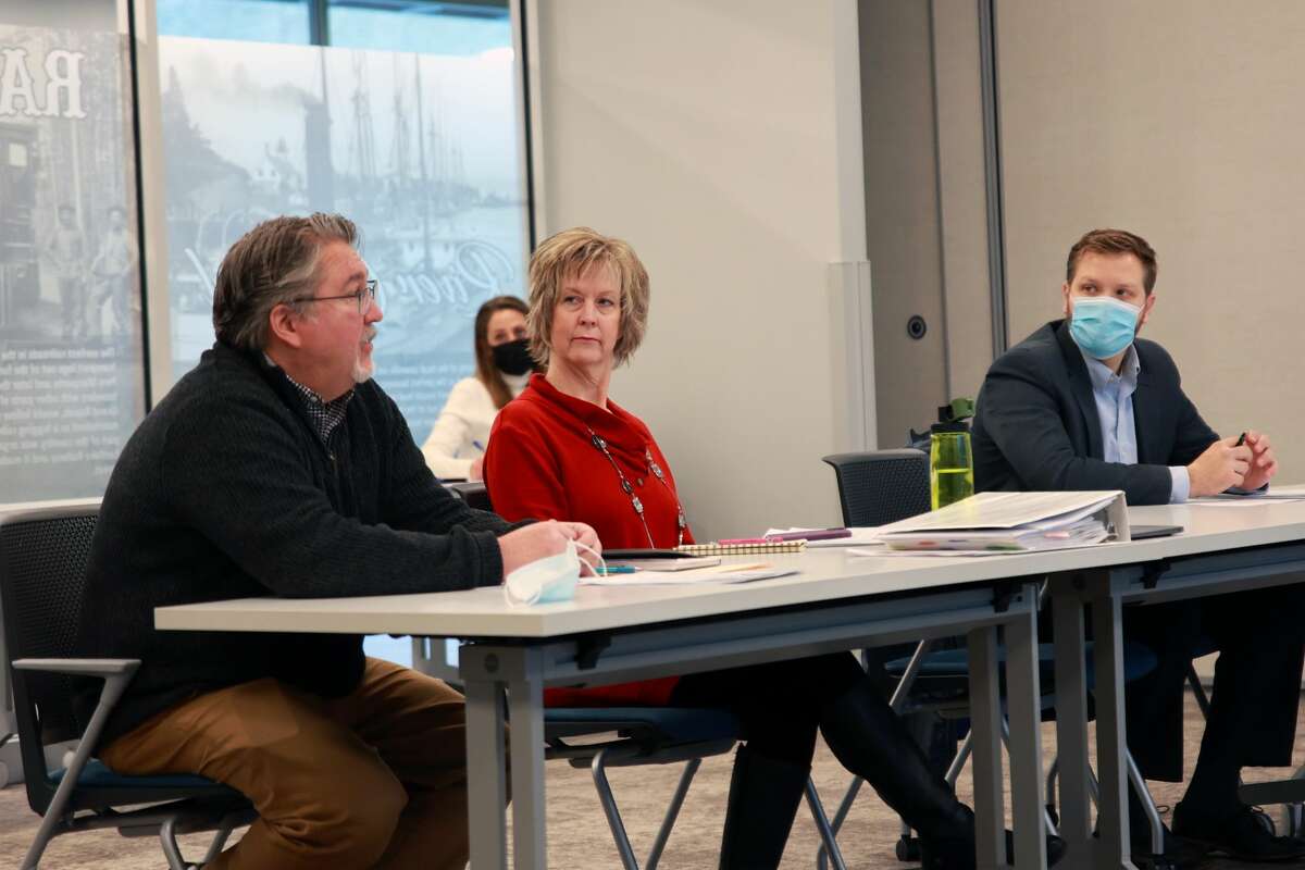 (From left to right), Marc Miller, Economic Development Director for the Manistee Chamber of Commerce, Kristina Bajtka, director of communications and investor relations for the chamber and DDA point person, and Manistee City Manager William Gambill take part in a Dec. 8 DDA meeting.
