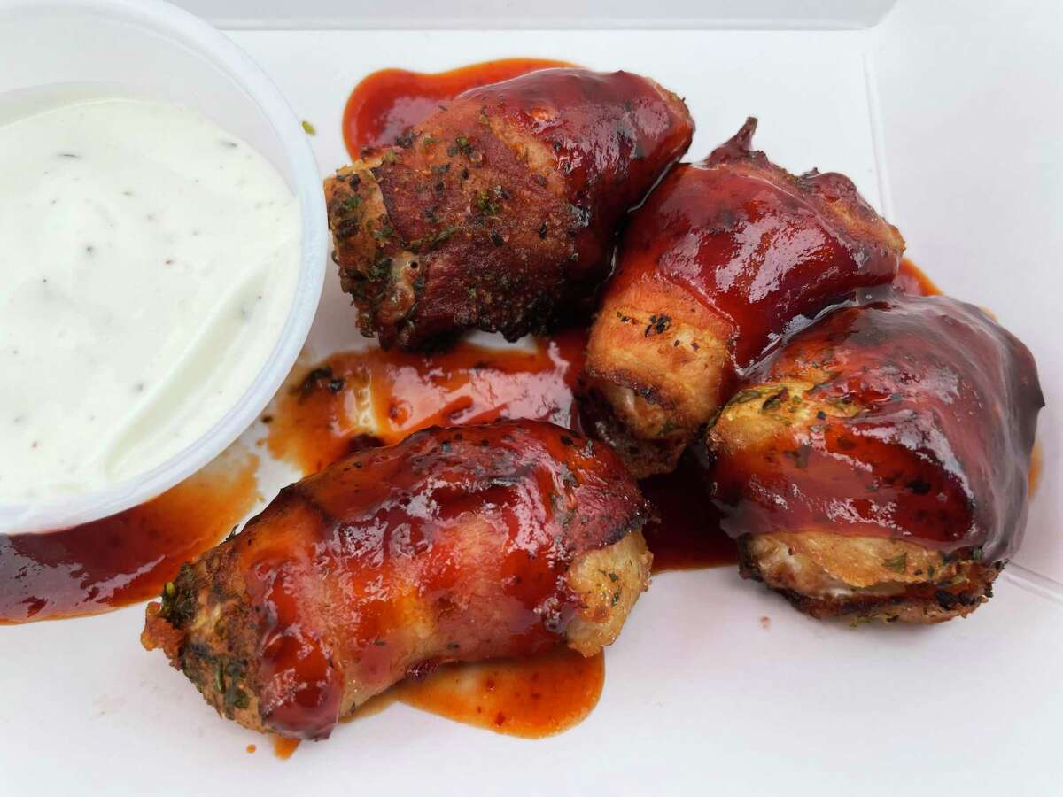 The Chicapeños at Satisfried are chicken breast chunks and jalapeño wrapped in bacon and fried.