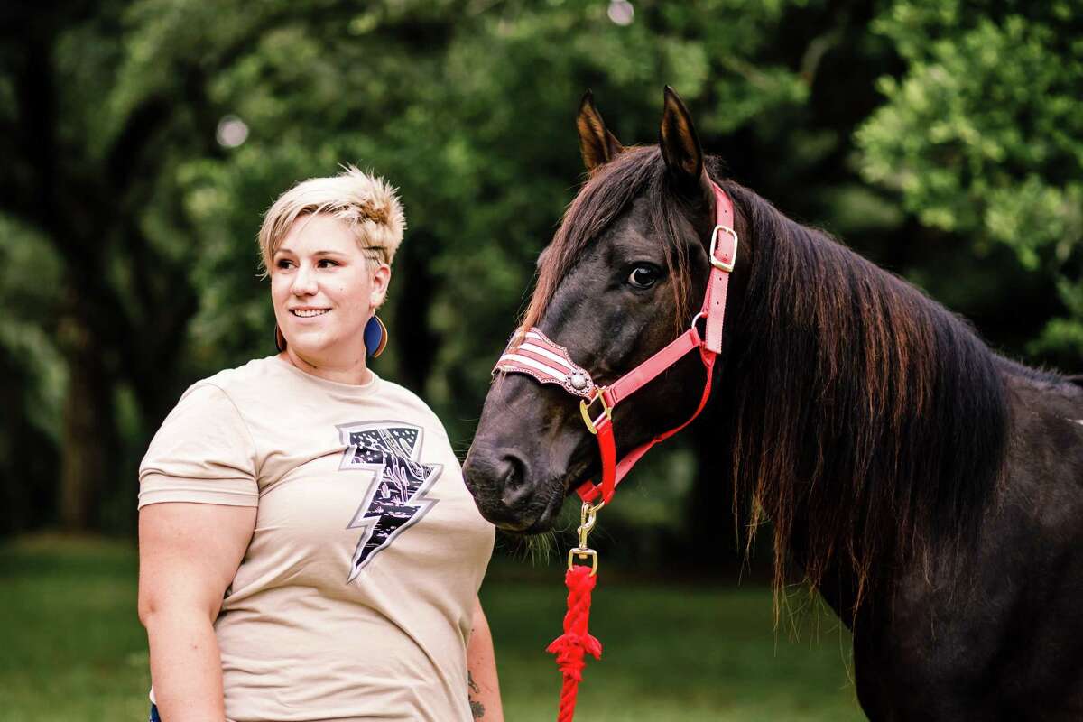 Maureen Gard Friedly advocates for assault survivors and attends an equine-assisted psychotherapy program to help deal with her military sexual trauma. She’s pictured with her horse, Chap.