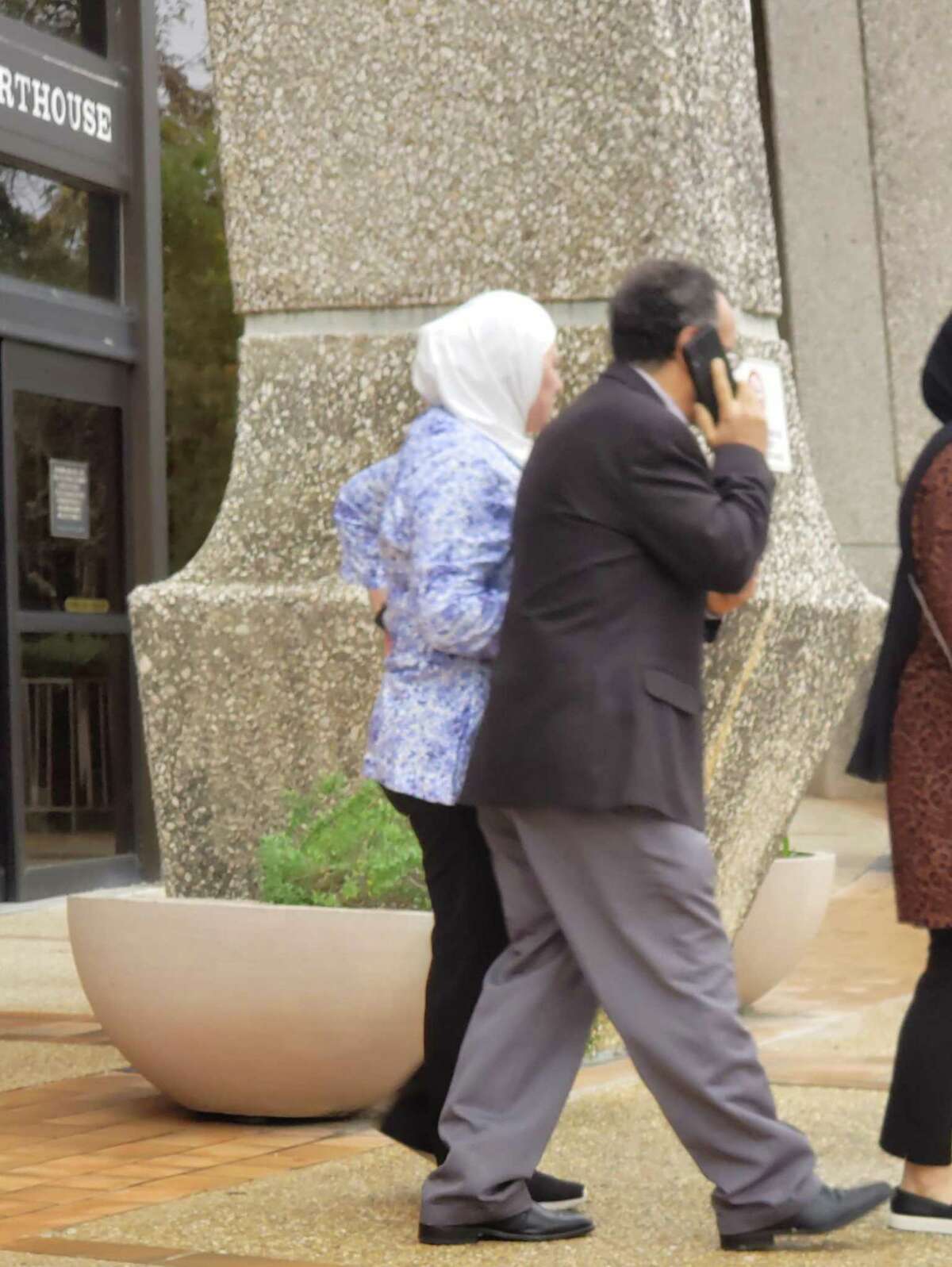 Imad Eddin Wadi, talking on the phone, leaves San Antonio’s federal courthouse Thursday after rejecting a plea offer in his terrorism case that would have capped any prison sentence he got at eight years. He’s accused of assisting jihad fighters in Syria and faces up to life in prison.