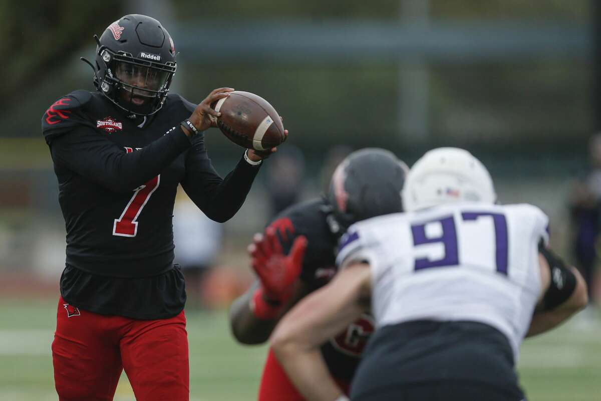 Incarnate Word Cardinals quarterback Cameron Ward (7) looks to make a pass during the second quarter of the opening round FCS playoffs against the Stephen F. Austin Lumberjacks at Benson Stadium in San Antonio, Texas, Saturday, Nov. 27, 2021.