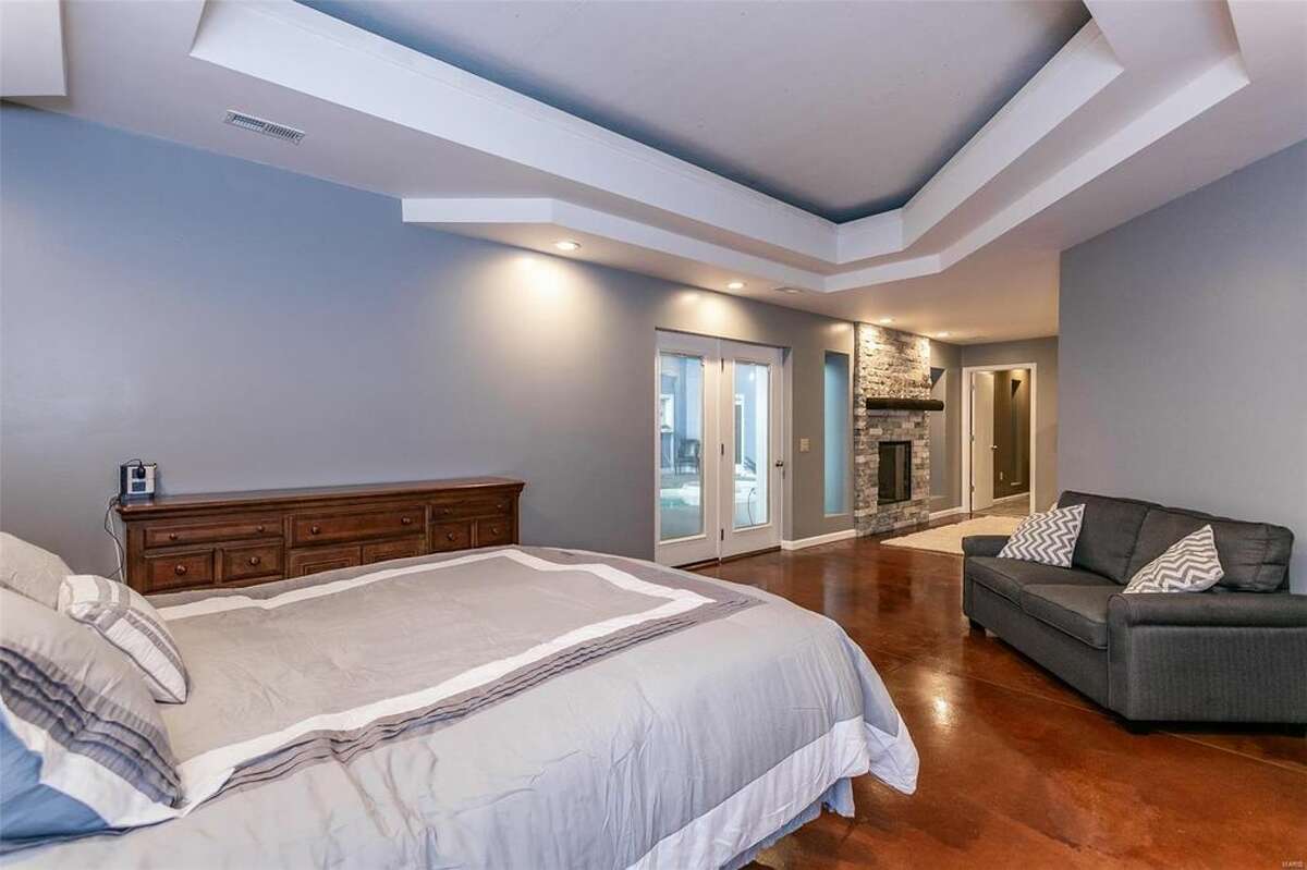 See inside this partially underground 1.1M Illinois home with pool, gym