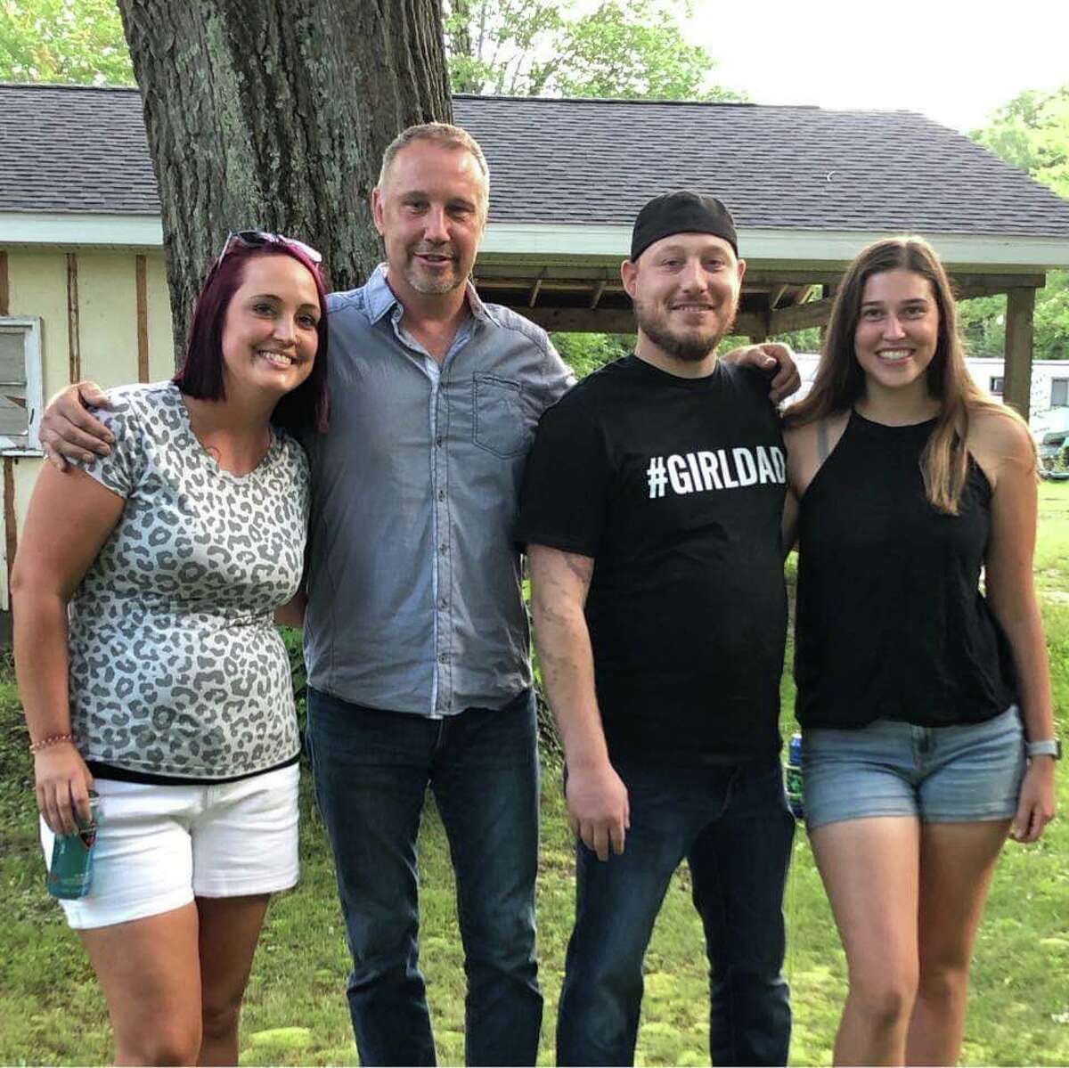 Tony Iafrate is pictured with his children (from left) Linda, Jeremy, and Gracie.