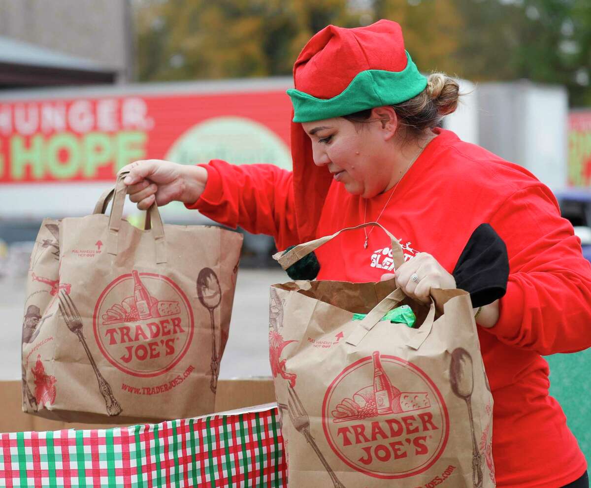 Irma Cintron helps unload donated goods during Montgomery County Food Bank’s annual holiday food drive Dec. 4 in Conroe. Last year, the nonprofit received 70,000 pounds of food. Needs-based organizations in Montgomery County are facing two realities at once. The need for their services is higher than ever, and inflation and supply-chain issues are stretching their already stressed budgets.