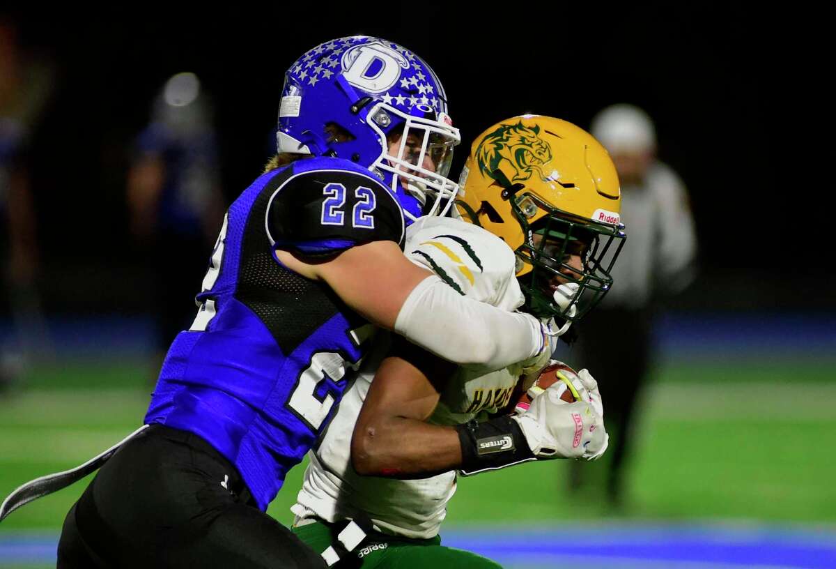Christian Alliegro signs Wisconsin football from Avon Old Farms.