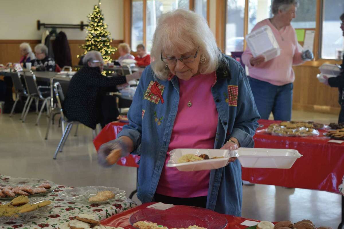 One of the participants in Thursday's Jacksonville Area Senior Center cookie walk makes a selection.