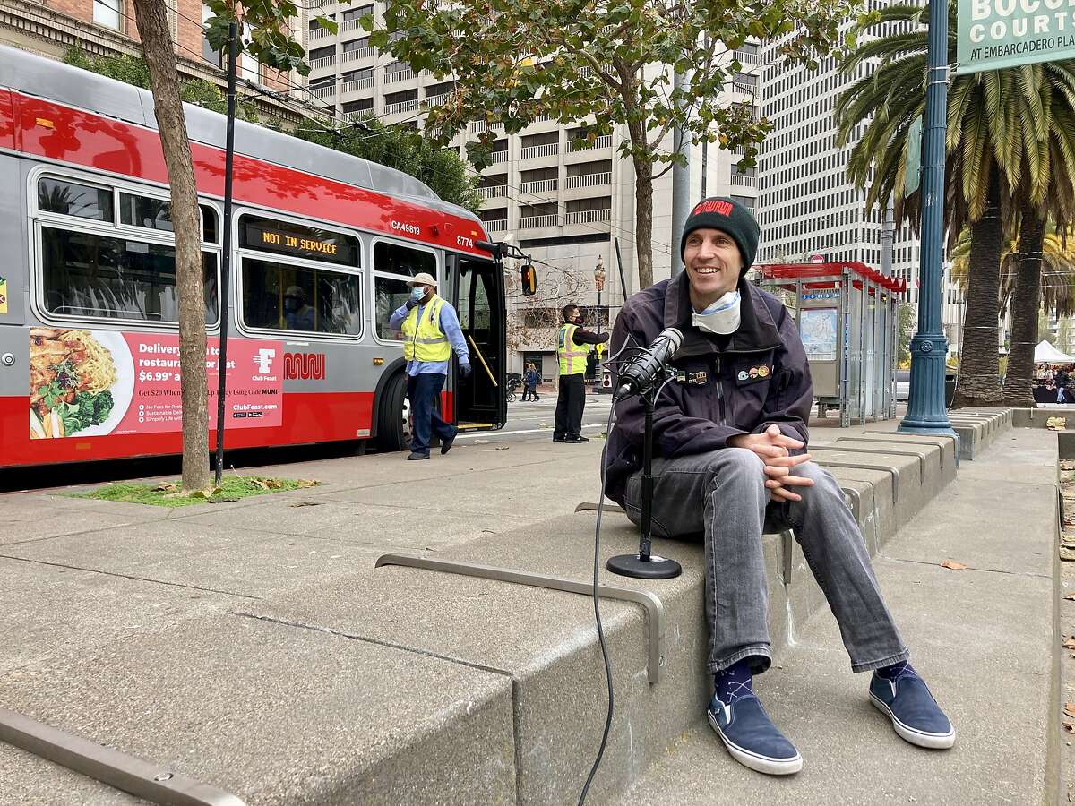 Mc "Mack" Allen sits near the bocce ball courts across from the Ferry Building, during a Total SF podcast for the San Francisco Chronicle.