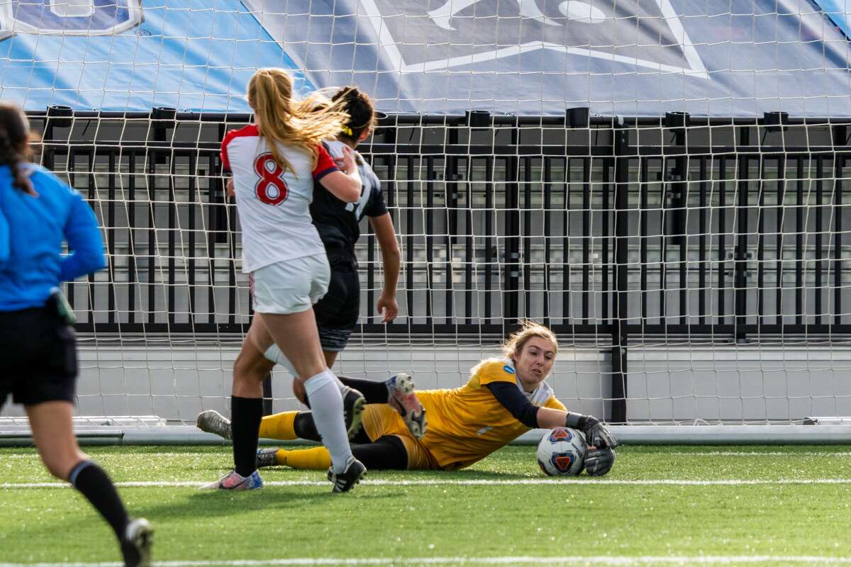 Saint Rose goalie Marika Laurendeau makes one of her 10 saves against Dallas Baptist University in a NCAA Division II Tournament semifinal.