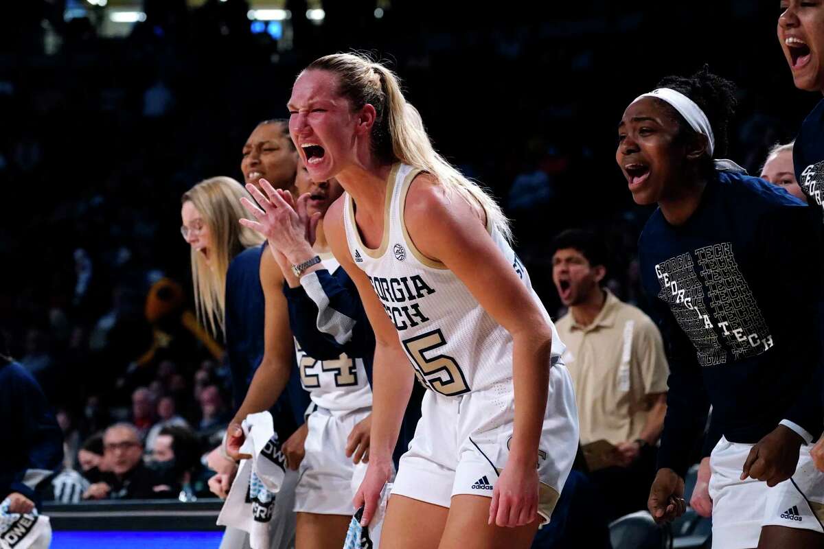 Georgia Tech forward Digna Strautmane (45) and teammates react to a foul call during the first half of the team's NCAA college basketball game against Connecticut on Thursday, Dec. 9, 2021, in Atlanta. (AP Photo/John Bazemore)