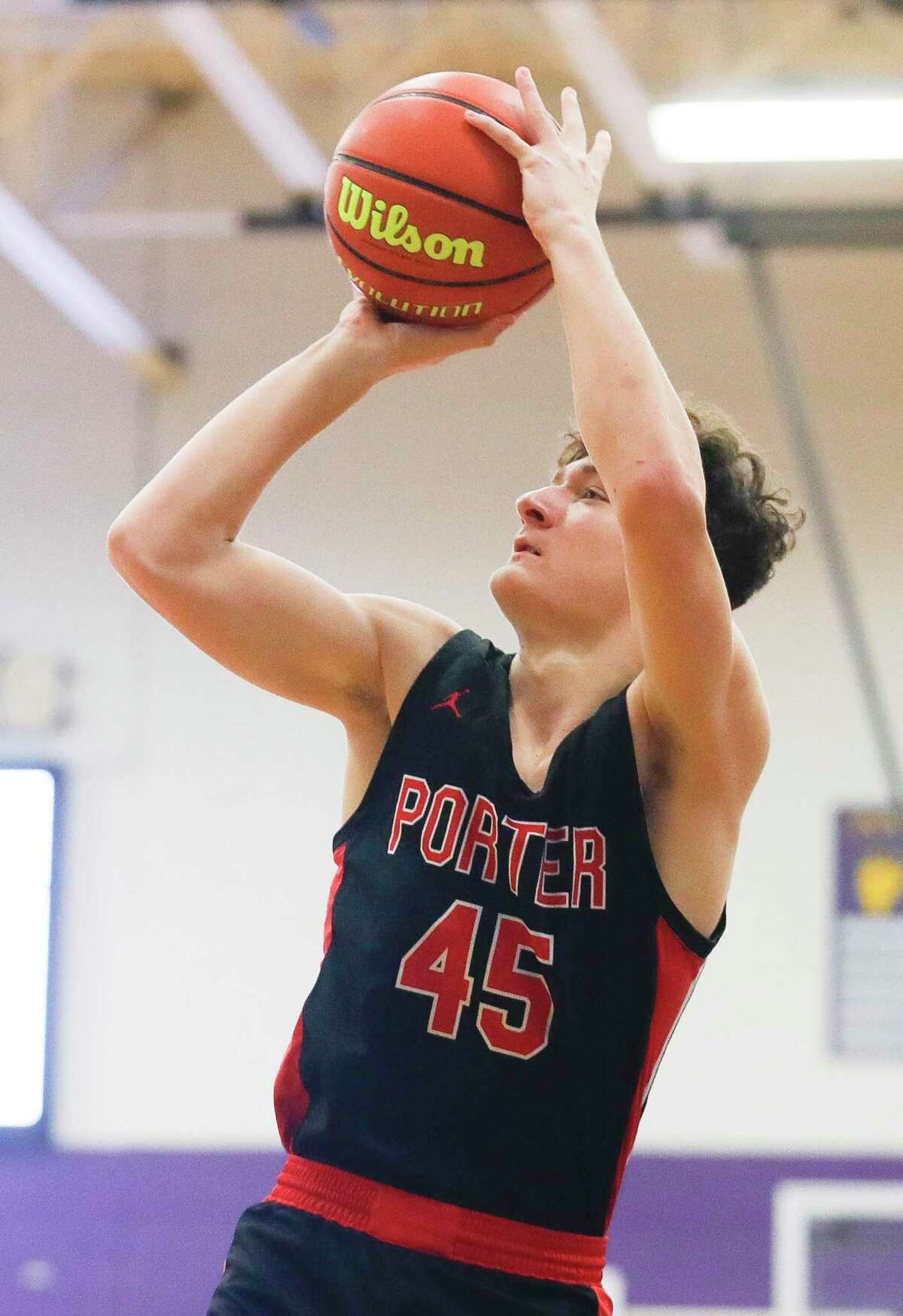 Porter center Christian Parker (45) shoots during the a game in the Montgomery Schurr Insurance Holiday Classic boys basketball tournament at Montgomery High School, Thursday, Dec. 9, 2021, in Montgomery.