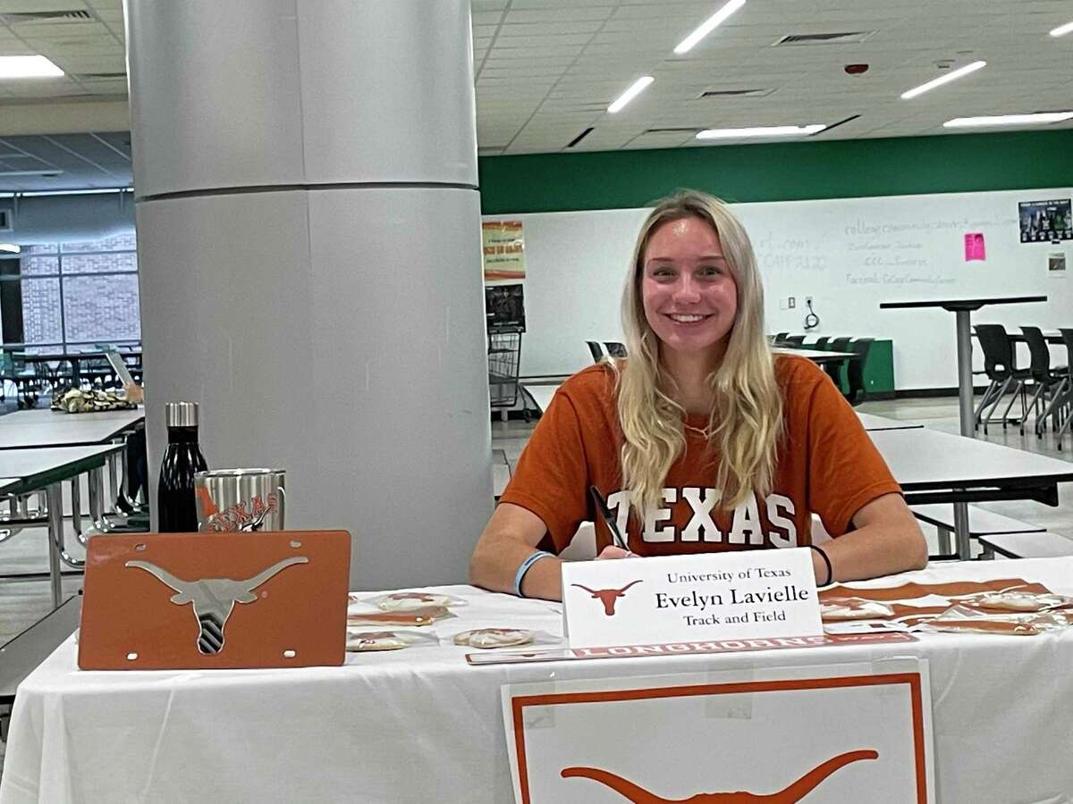 Stratford's Evelyn Lavielle celebrated signing her National Letter of Intent to compete in track and field at the University of Texas-Austin during a ceremony at the school on the afternoon of Dec. 7.