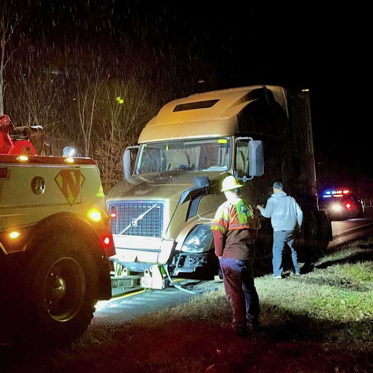 Connecticut State Police said the tractor-trailer driver was cited for his alleged inability to follow the state’s Move Over law on Interstate 395 in Norwich, Conn., on Wednesday, Dec. 8, 2021.
