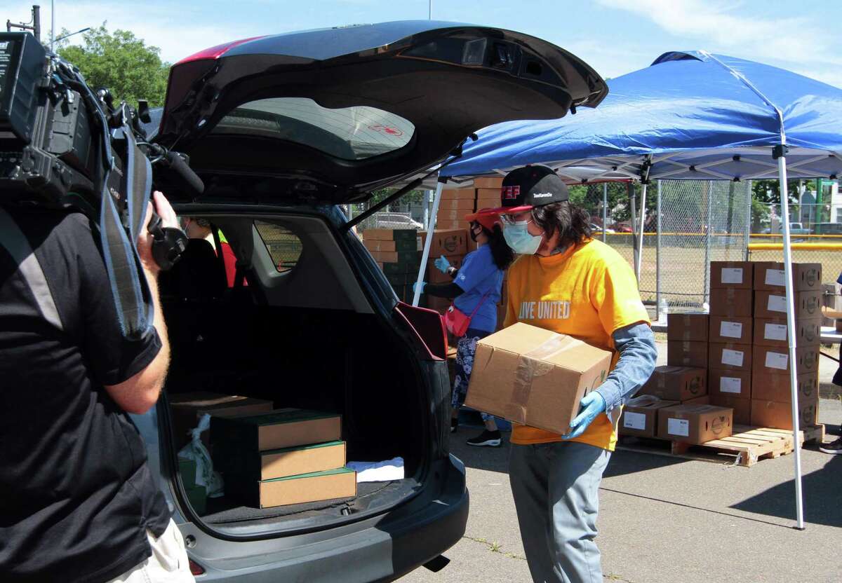 A Connecticut Food Bank led drive-thru food distribution event was held at Bowen Field in New Haven, Conn., on Thursday June 25, 2020.