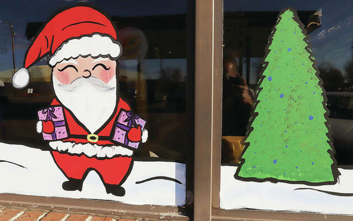 Santa Claus was incorporated in the Hartford Casey’s General Store window by Kimberly Harty.
