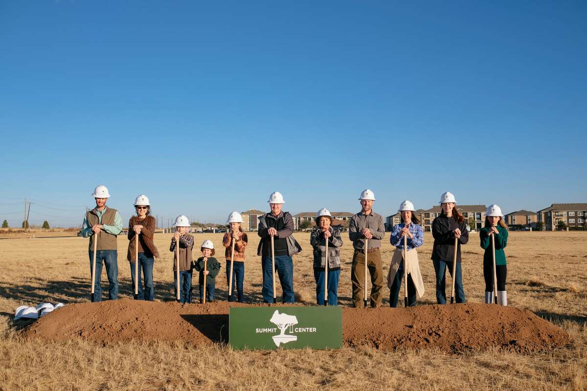 The Johnson and Woodard families were among those participating in the Summit Center groundbreaking in December 2021. Summit Energy, developer of the site, added green space and retail to its office plans to help improve Midland's quality of life.