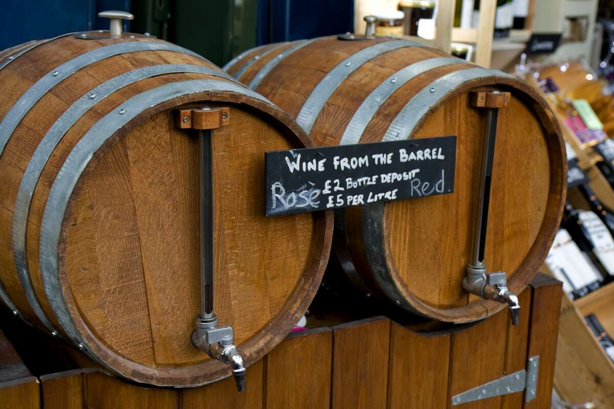 Barrels of wine are pictured ready for decanting into bottles at an indoor market. The ability to have tastings in Michigan farmers markets could lead to more sales.