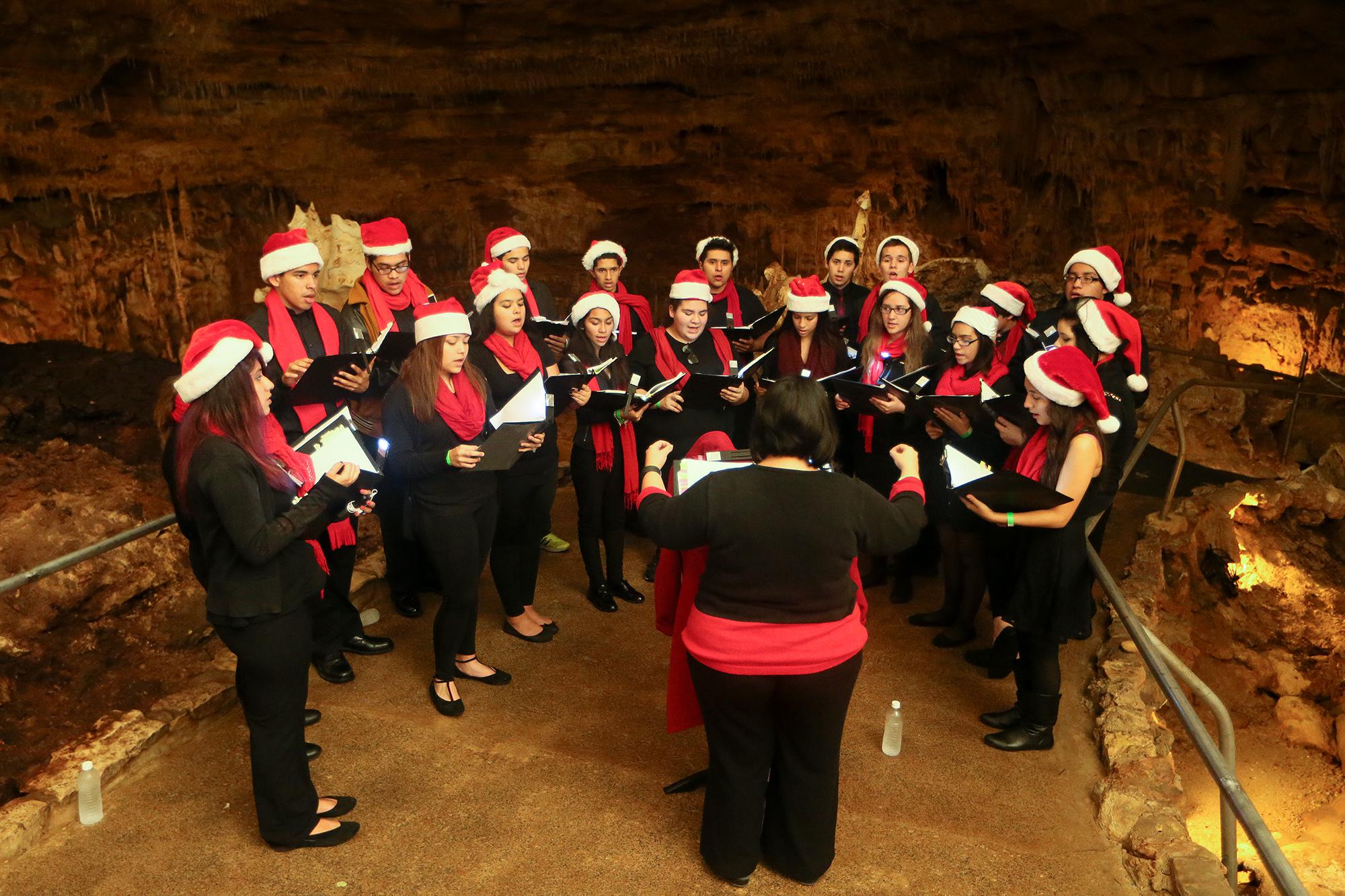 Carols echoing underground, Santa, a trail of lights Christmas at the