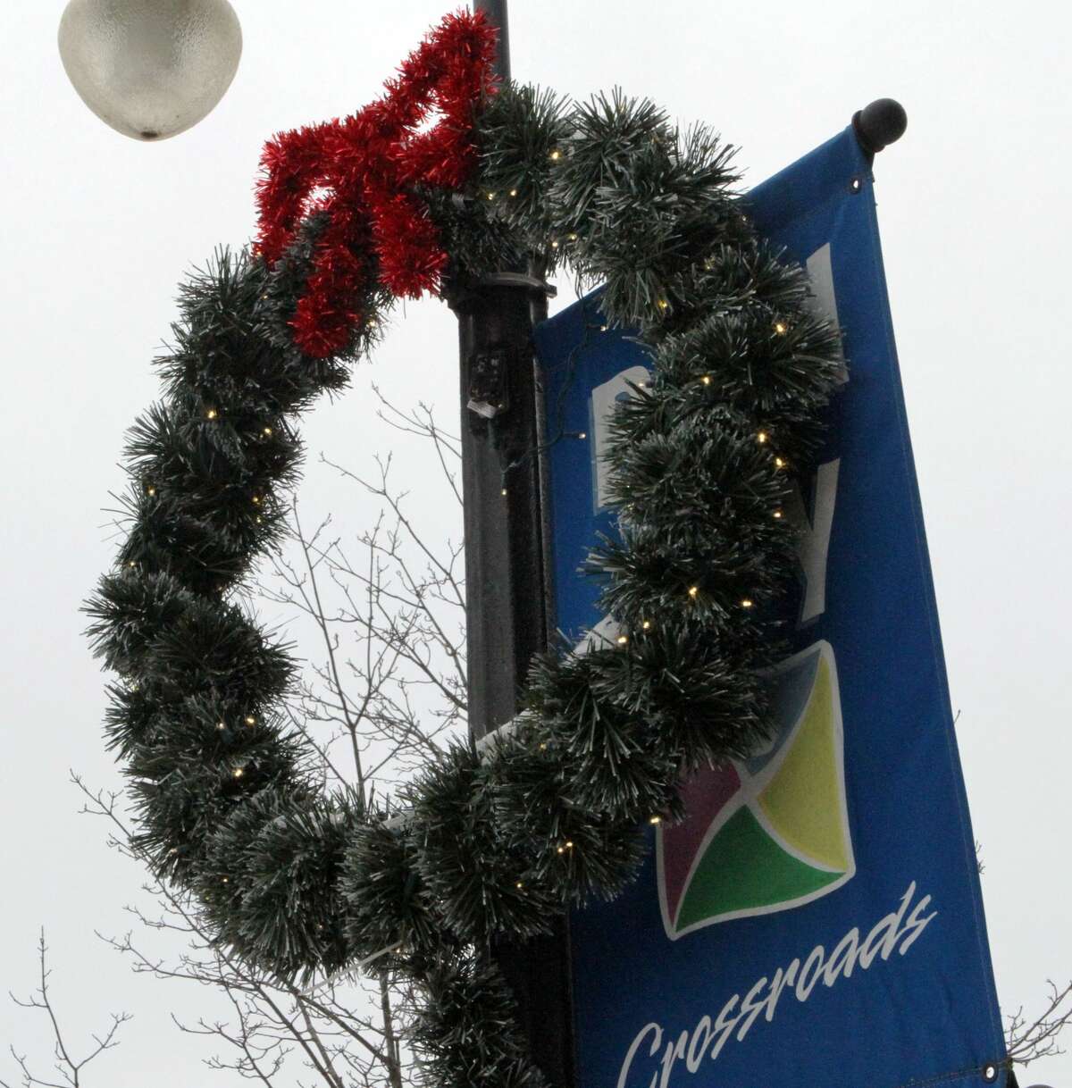Floods of red and green Christmas decorations can be seen throughout downtown Reed City early Friday afternoon.