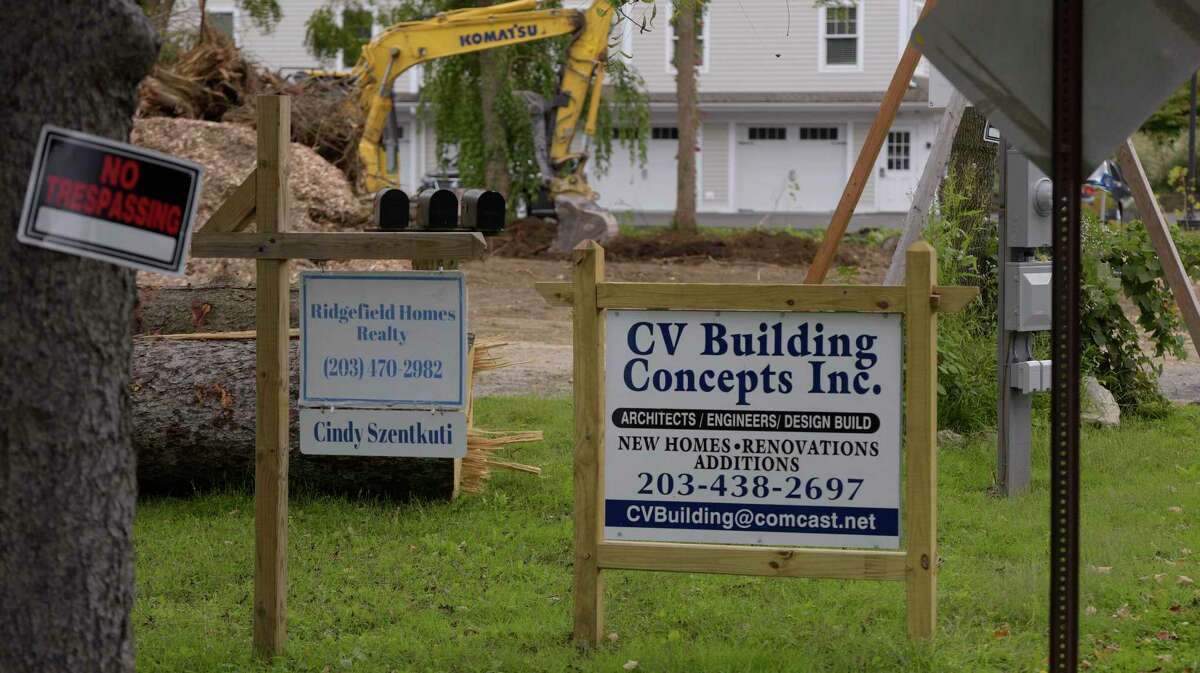 CV Building Concepts razed houses at 8-10 New Street. Thursday, Sept. 30, 2021. Ridgefield, Conn.