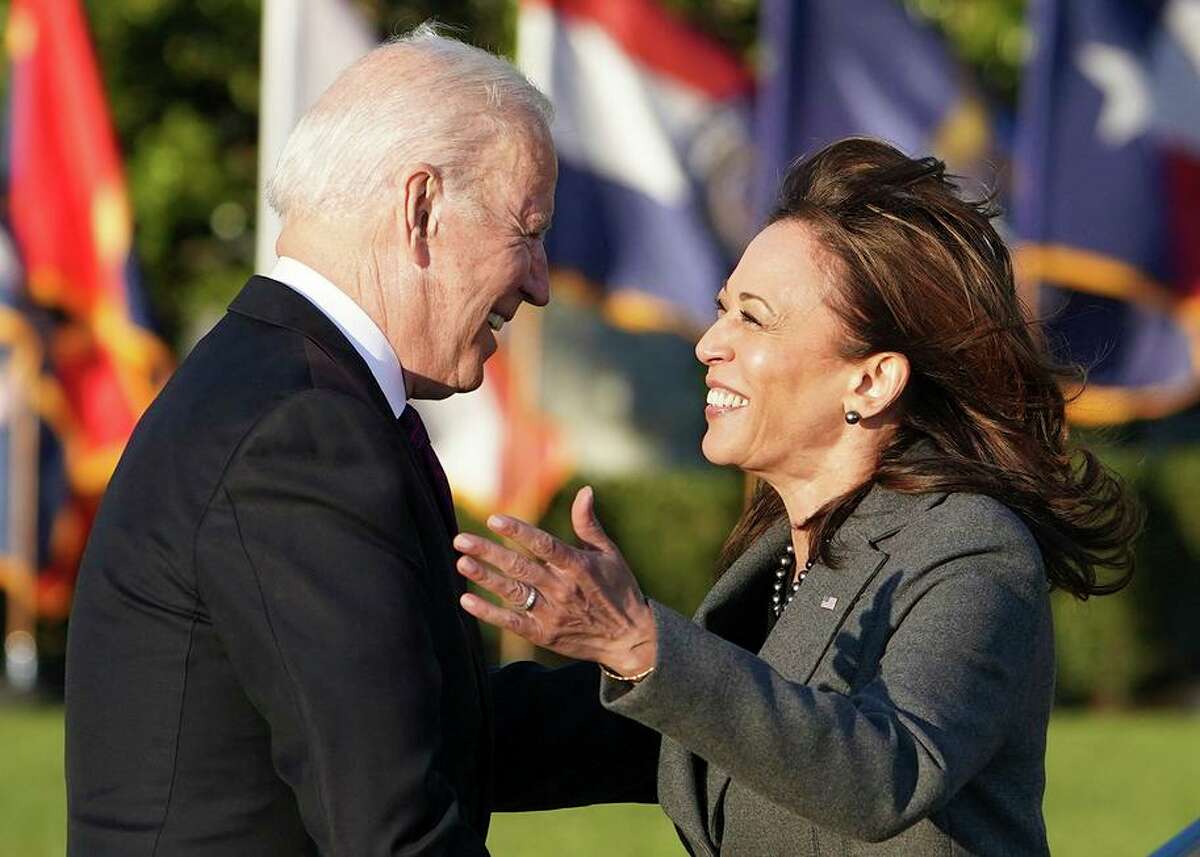 President Biden and Vice President Kamala Harris celebrate the passage of a sweeping infrastructure bill in November.