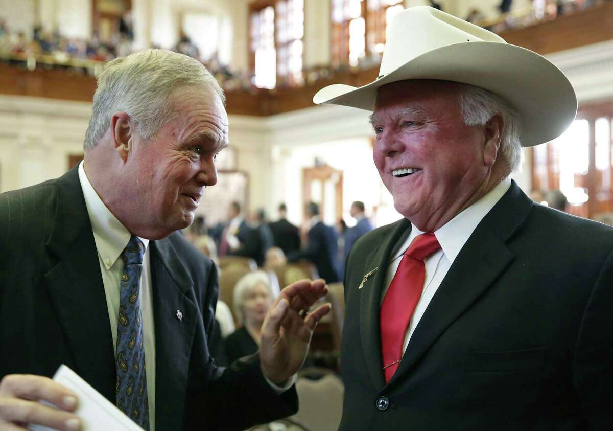 Texas Railroad Commissioner Wayne Christian, left, talks with Agriculture Commissioner Sid MIller in 2019. A recent op-ed from Christian left one reader searching for better future railroad commissioners.