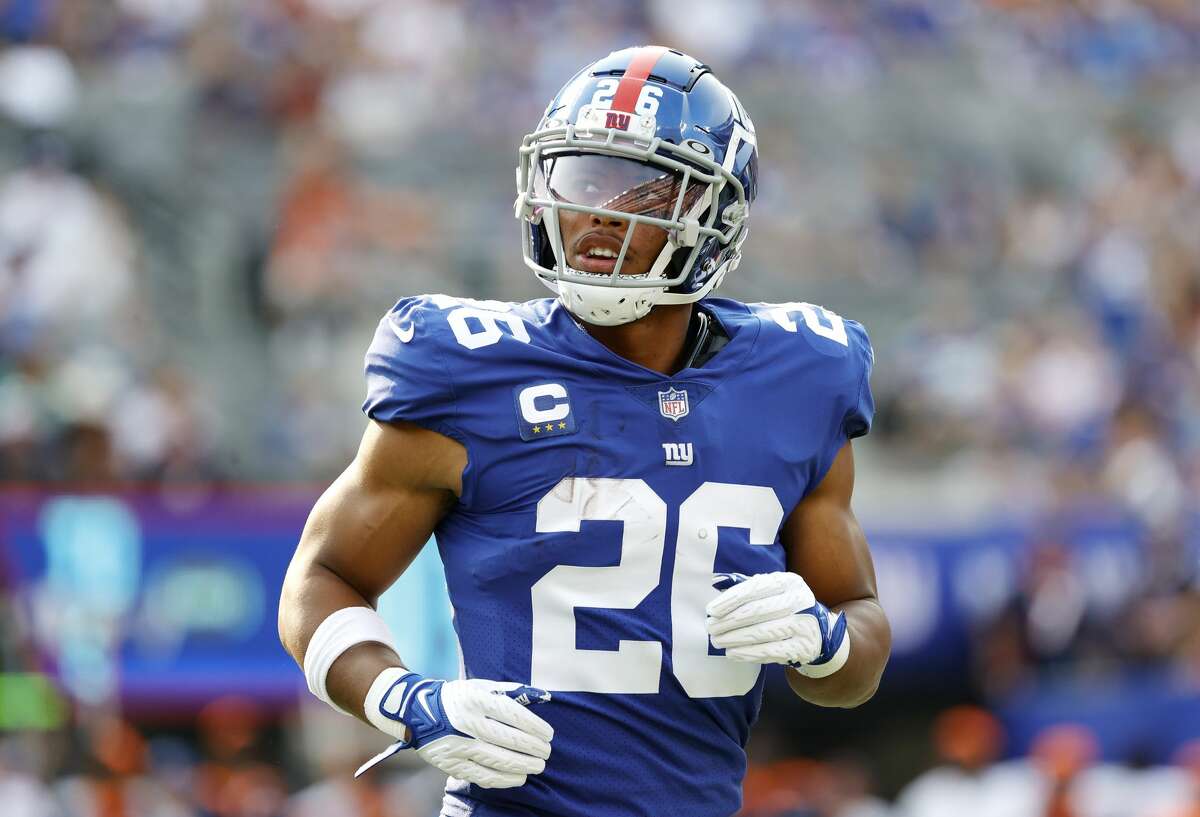 Saquon Barkley #26 of the New York Giants looks on during the game against the Denver Broncos at MetLife Stadium on September 12, 2021 in East Rutherford, New Jersey. 