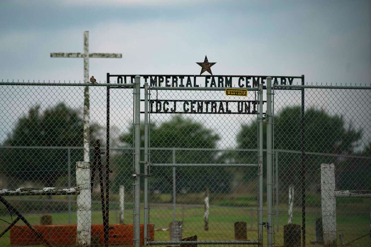 The Imperial Prison Farm Cemetery, Thursday, Dec. 9, 2021, in Sugar Land. The existing cemetery is not far from where human remains were found during the construction of Fort Bend ISD’s James Reese Career and Technical Center in 2018. Reginald Moore, who maintained the Imperial Prison Farm Cemetery, made it his mission to implore people that there were more remains of victims of Texas’ convict-leasing program on the land. A new cemetery next to the James Reese Career and Technical Center now marks the remains of the Sugar Land 95. Fort Bend ISD last month approved a contract with MASS Design, an international architecture non-profit, to create a design for an outdoor exhibit to honor the Sugar Land 95.