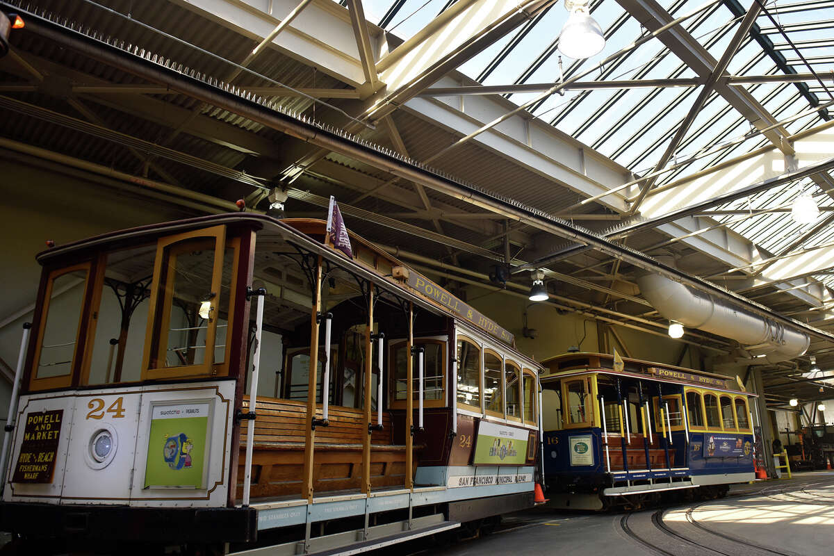 Two cable cars are idling in the cable car garage between Jackson and Washington in San Francisco. 