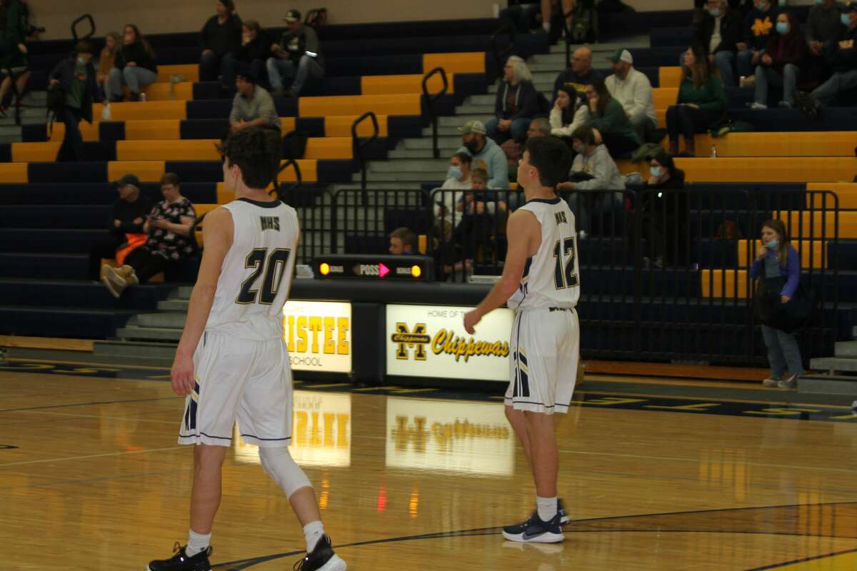 Manistee's Caiden Cudney and Jacob Sharp prepare for the next possession. 