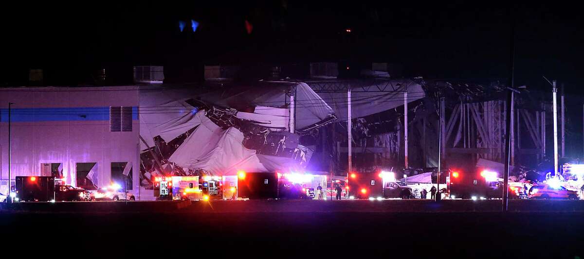 The Amazon distribution center is partially collapsed after being hit by a tornado on Friday, Dec. 10, 2021 in Edwardsville, Ill. (Robert Cohen/St. Louis Post-Dispatch via AP)