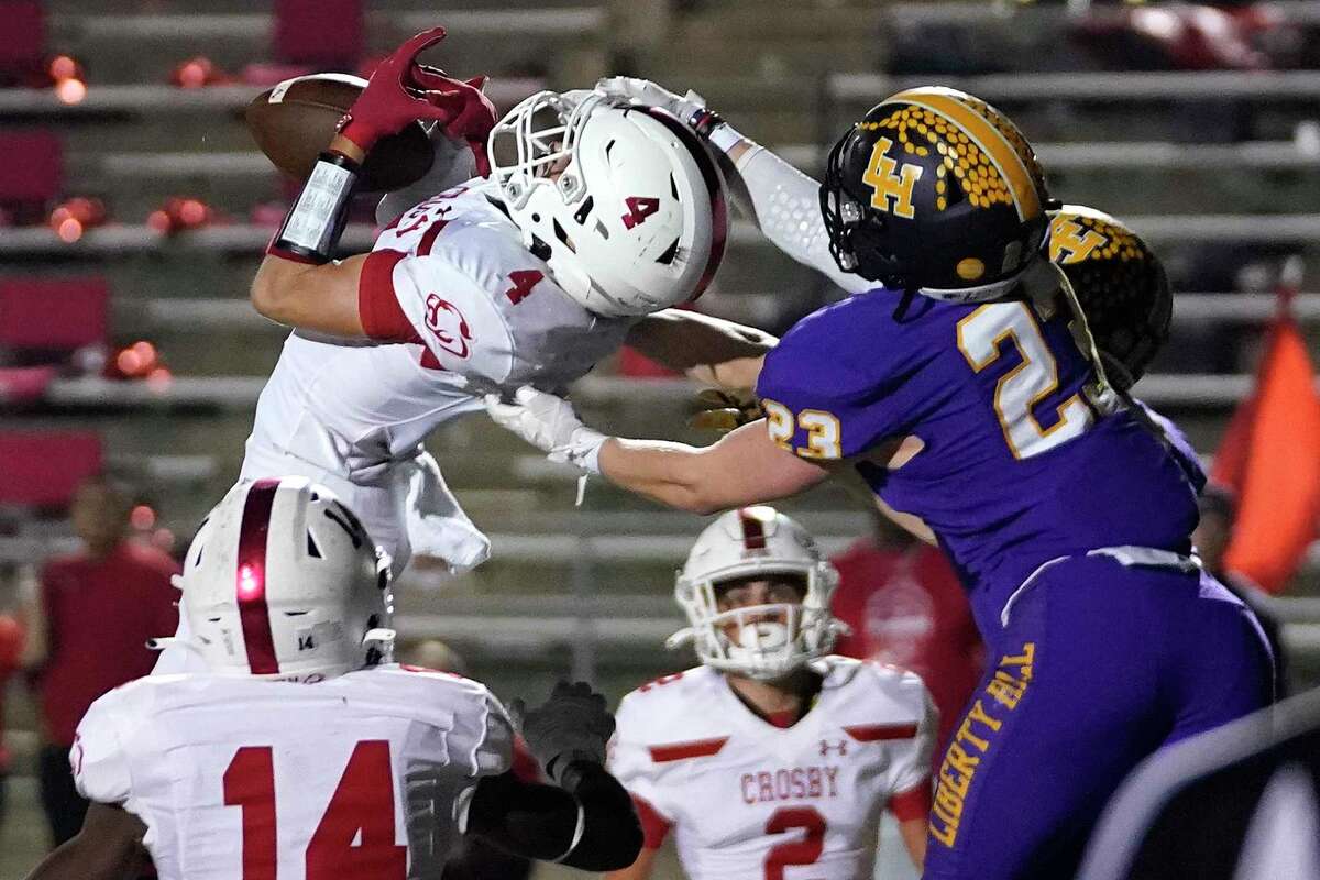 Crosbt wide receiver Braden Womack can’t hold on to a pass in the end zone as Liberty Hill free safety Noah Long defends in the first half of Liberty Hill’s victory. The Cougars finished the season 12-3.