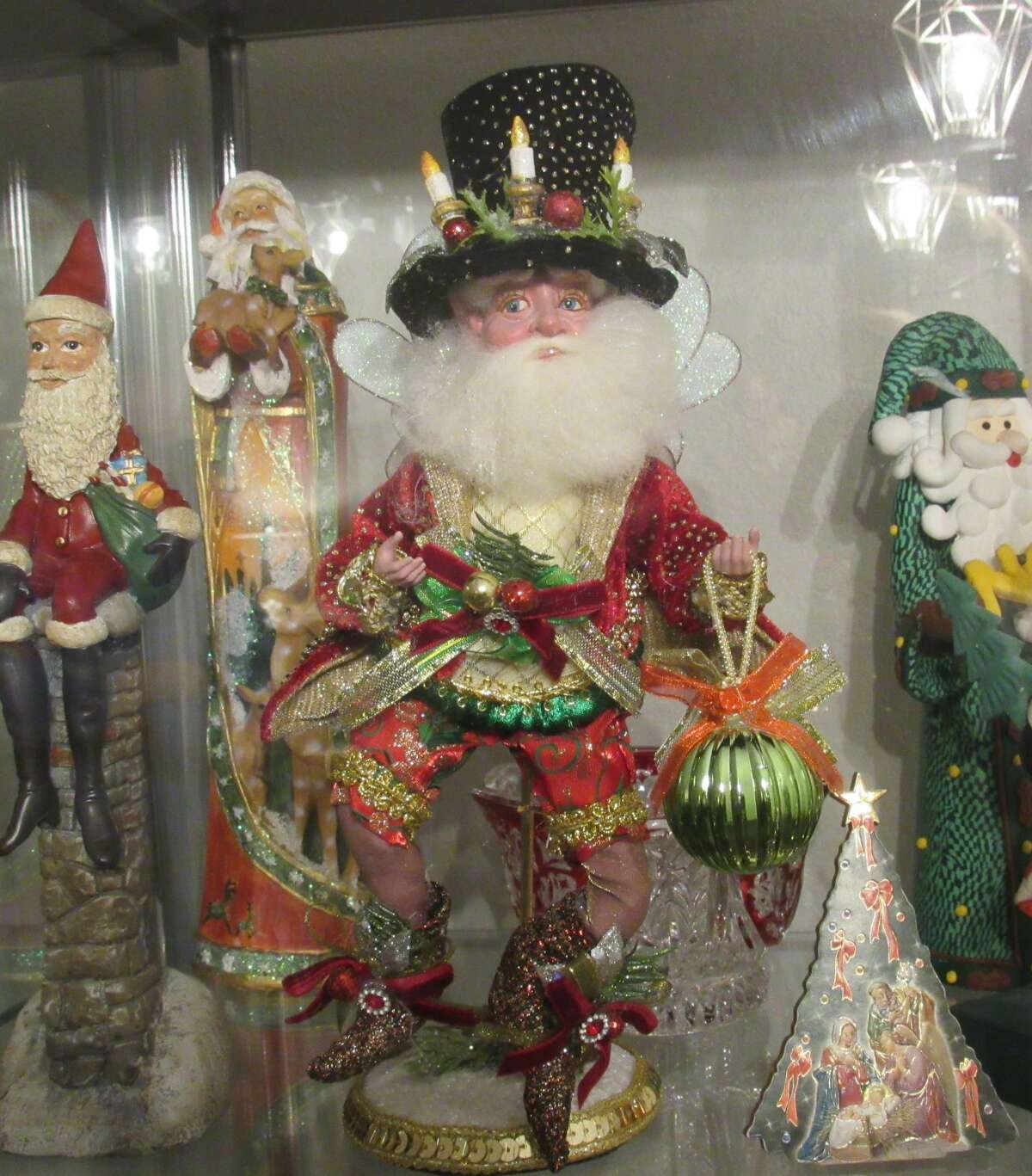 One of the newest Santas in the MacLaughlin's collection is this winged, fairy-like Santa. 