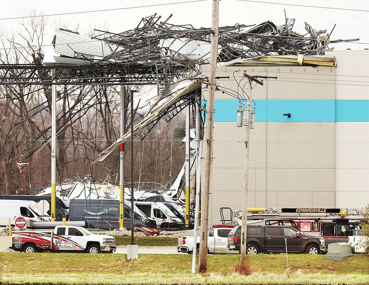 An area about the size of a football field of the Amazon warehouse in Edwardsville collapsed during a storm Friday night killing two workers inside the massive warehouse. The warehouse, located on South Gateway Commerce Center Drive, had a path cut through it from west to east.