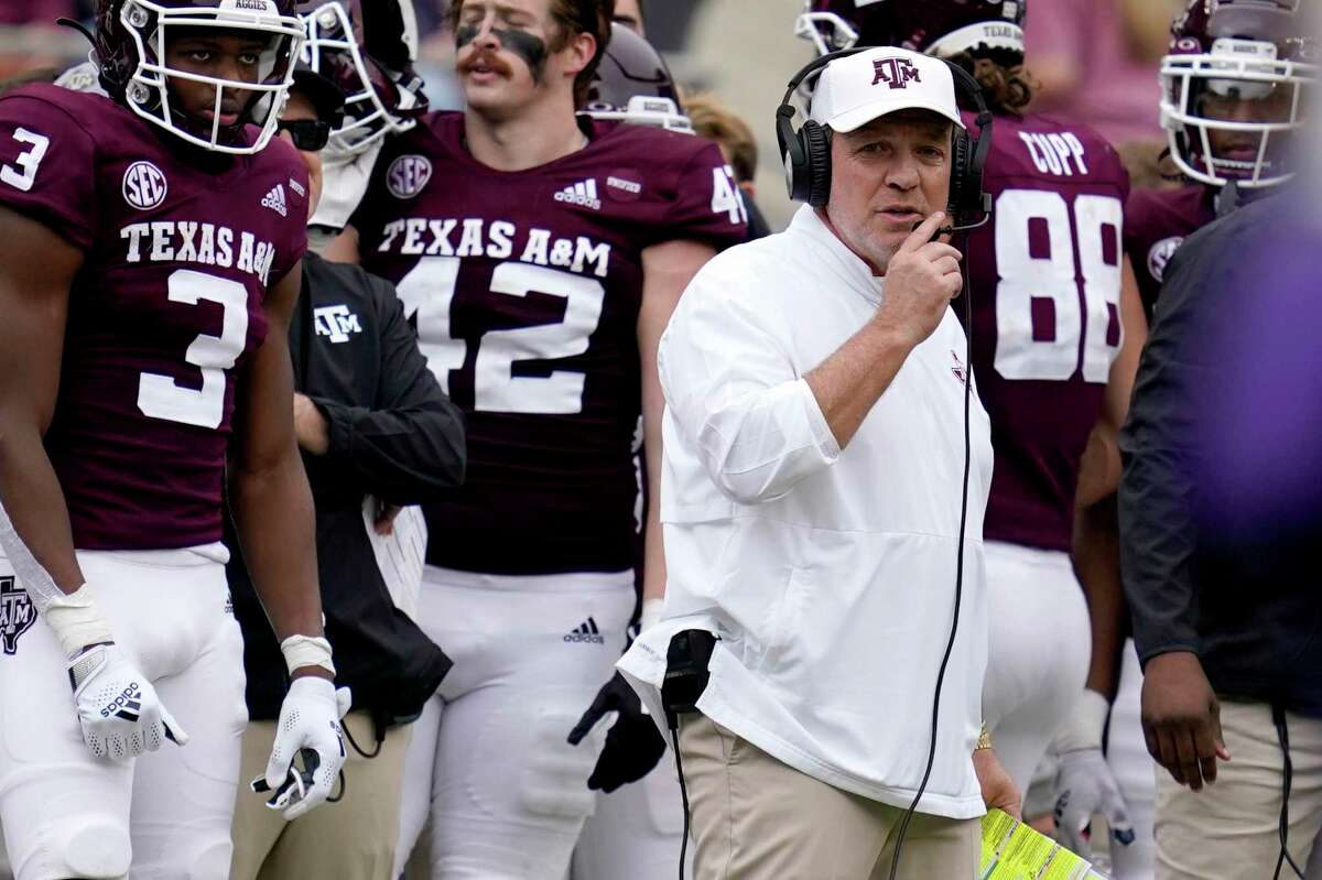 Texas A&M head coach Jimbo Fisher calls plays against Prairie View A&M during the first half of an NCAA college football game on Saturday, November 20, 2021, in College Station, Texas. (AP Photo/Sam Craft)