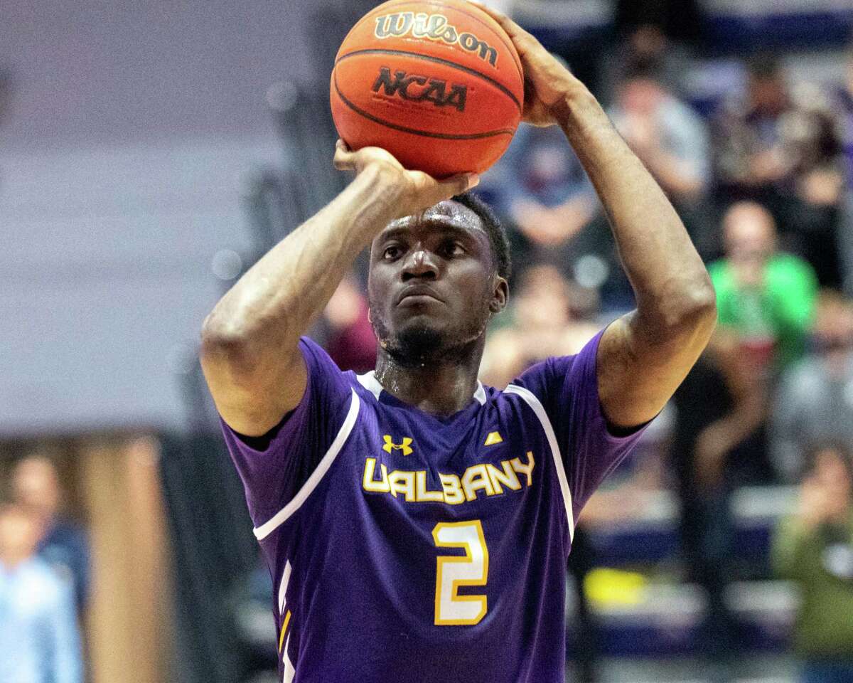 UAlbany graduate student De’Vondre Perry hits the game-winning foul shot against Columbia University. The win was UAlbany's second of the season. Perry said the Danes can make up for anyone missing from the lineup by turning up their competitiveness.