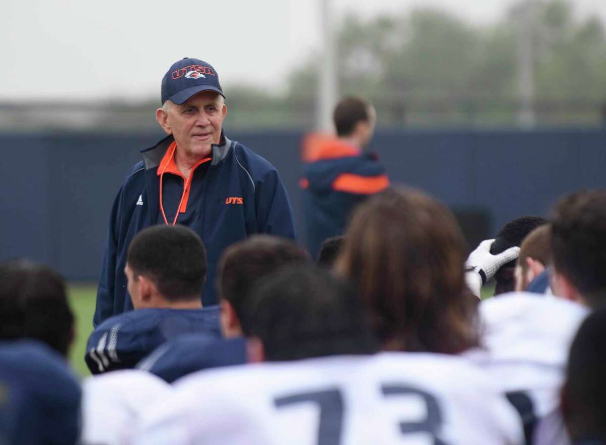 UTSA football coach Larry Coker speaks to his team during an open practice on campus on Saturday, April 11, 2015.
