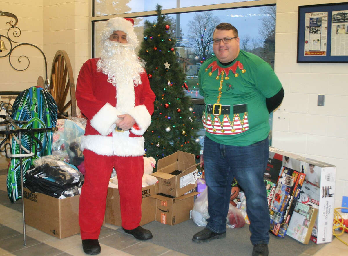 Santa and Big Rapids Police Officer William Sell were on hand to collect donations at the Big Rapids Department of Public Safety annual Season of Giving Gift Drive on Saturday. Although reindeer Boomer was unable to attend, Santa was available for pictures.