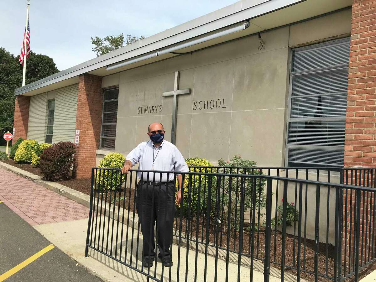 Deacon Dominic Corraro welcomed his first day of full time students as the new principal at St. Mary School in Milford.