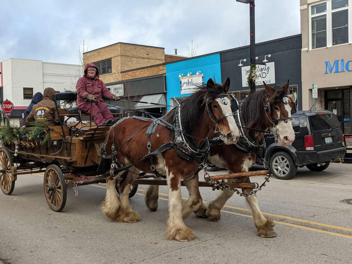 FILE PHOTO: Shoppers enjoyed Holly Jolly Days on Main Street in Midland each of the past two weekends. There were special deals, free horse-drawn carriage rides, a train ride, hot chocolate and more.