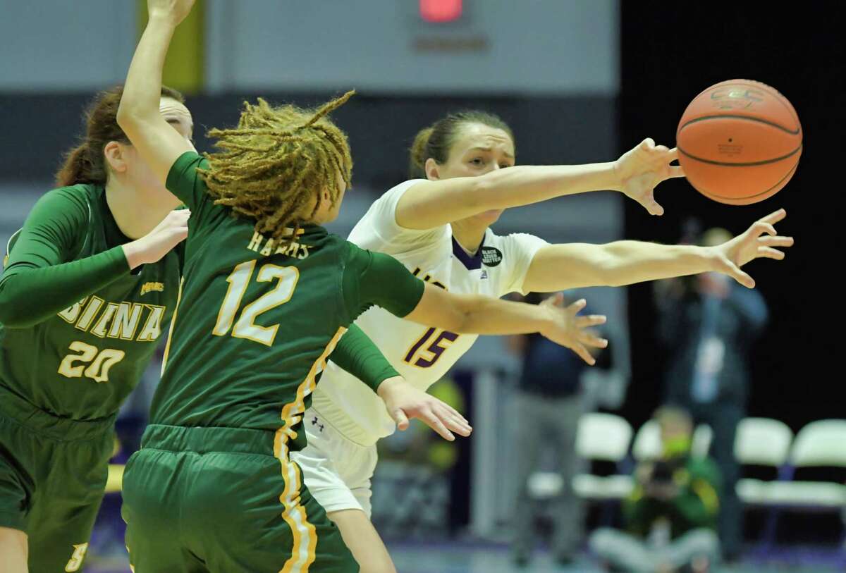 Morgan Haney of UAlbany passes off to a teammate during their game against Siena on Sunday, Dec. 12, 2021, in Albany, N.Y.