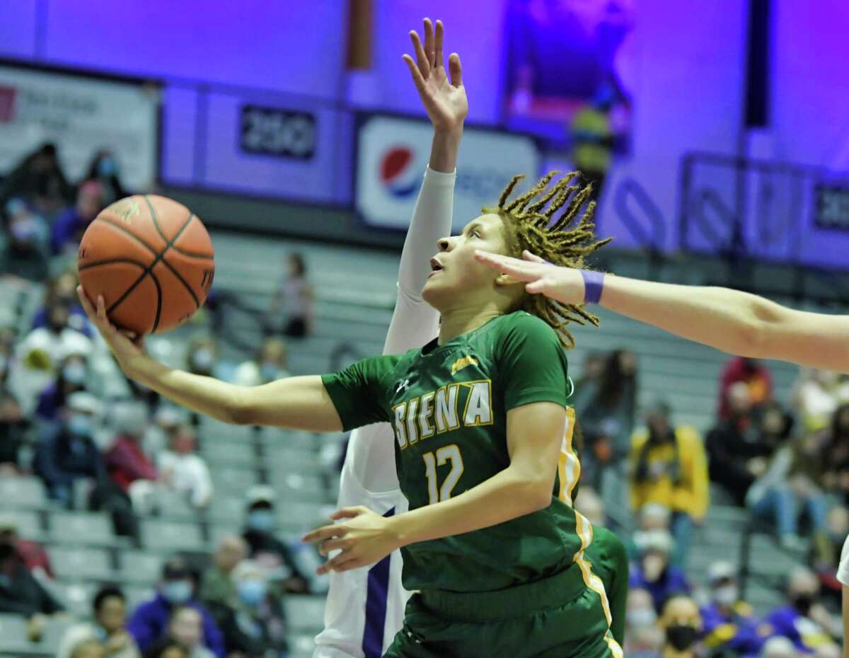 Imani Harris of Siena drives towards the basket during their game against UAlbany on Sunday, Dec. 12, 2021, in Albany, N.Y.