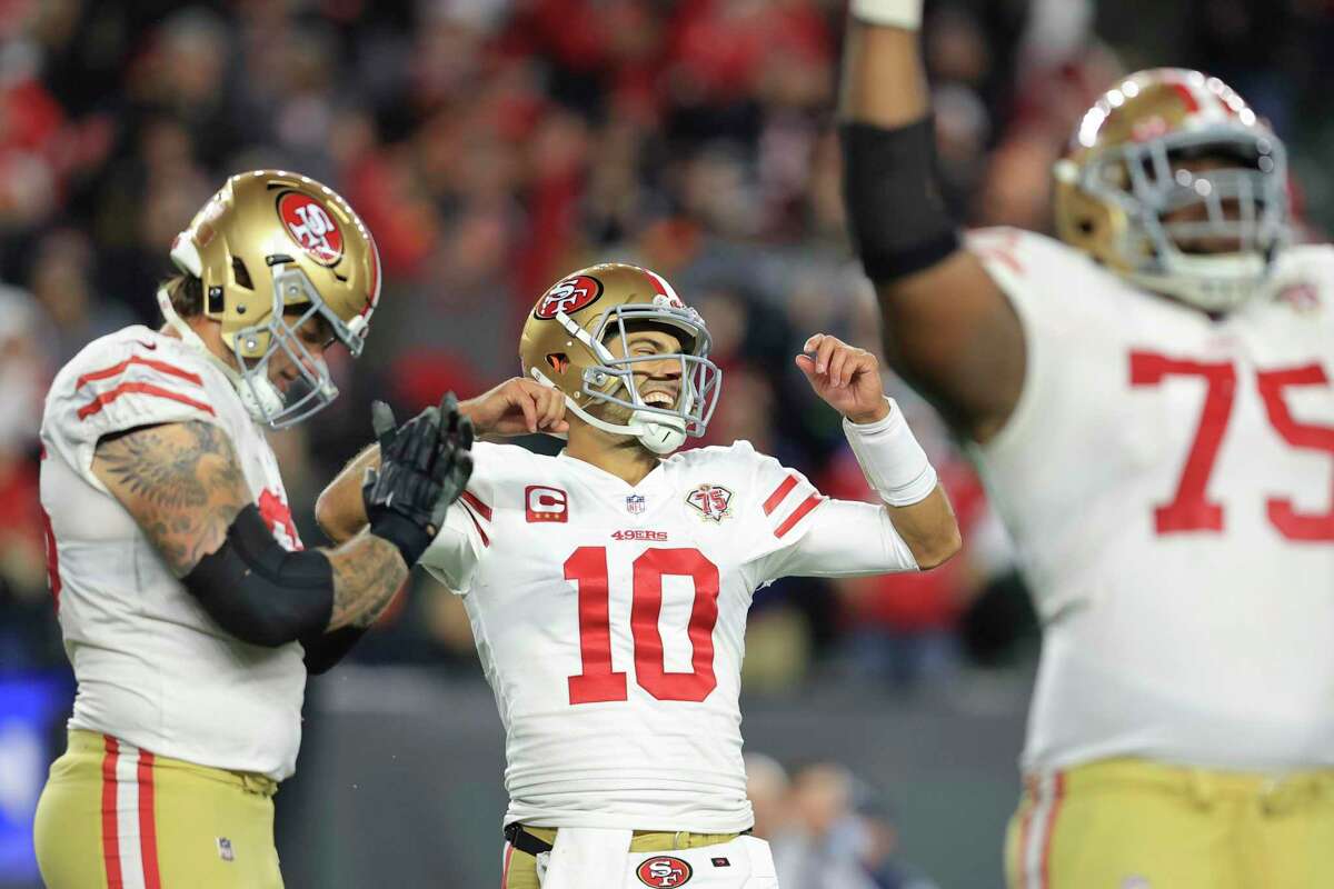 San Francisco 49ers quarterback Jimmy Garoppolo (10) reacts after throwing the game winning touchdown pass during overtime of an NFL football game against the Cincinnati Bengals, Sunday, Dec. 12, 2021, in Cincinnati. (AP Photo/Aaron Doster)