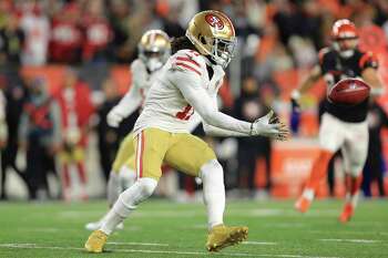 Santa Clara, California, USA. 18th Oct, 2020. San Francisco 49ers wide  receiver Brandon Aiyuk (11) celebrates touchdown with team member in front  of TV screen on Sunday, October 18, 2020, at Levis